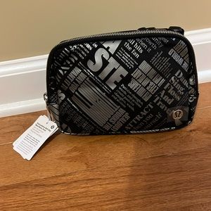 Lululemon belt bag “Manifesto” print